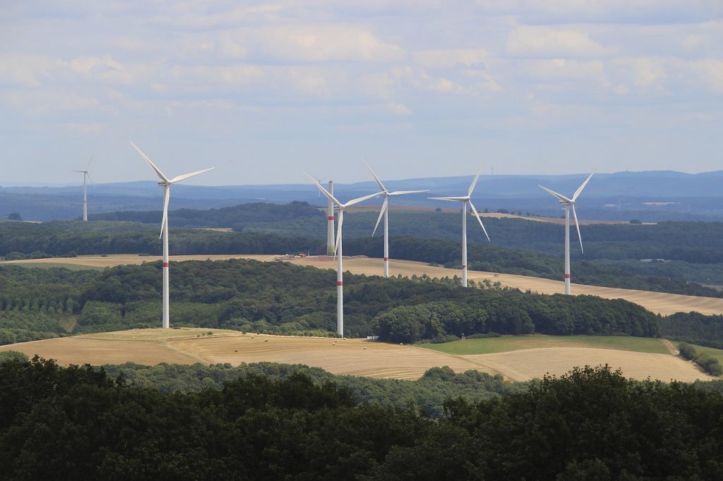 g8d94cd5dd234253047bc79c56e74314c13b1c0137fbd33067915a9eca5389202fb9881807069a4483aa962a8671972eeb294265e0196f98a125053ee9ca66b55 1280 5438666 windmill, nature, energy, wind power, pinwheel, windräder, environment, wind energy, sky, clouds